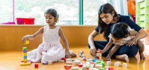 Children and caregiver playing activities 